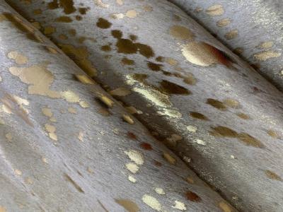 METALLIC ACID WASHED COWHIDE RUGS